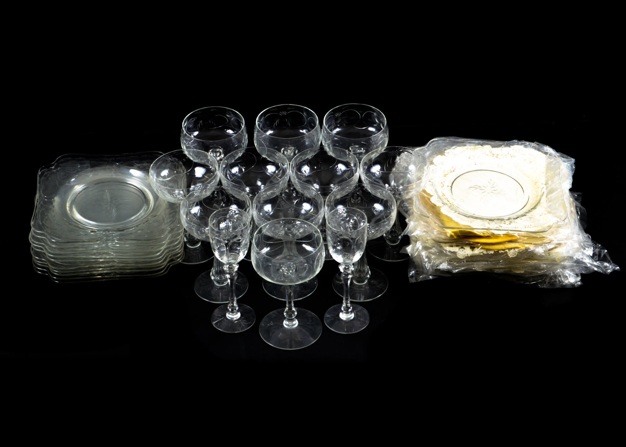 Assortment of Cut Glass plates and Glasses