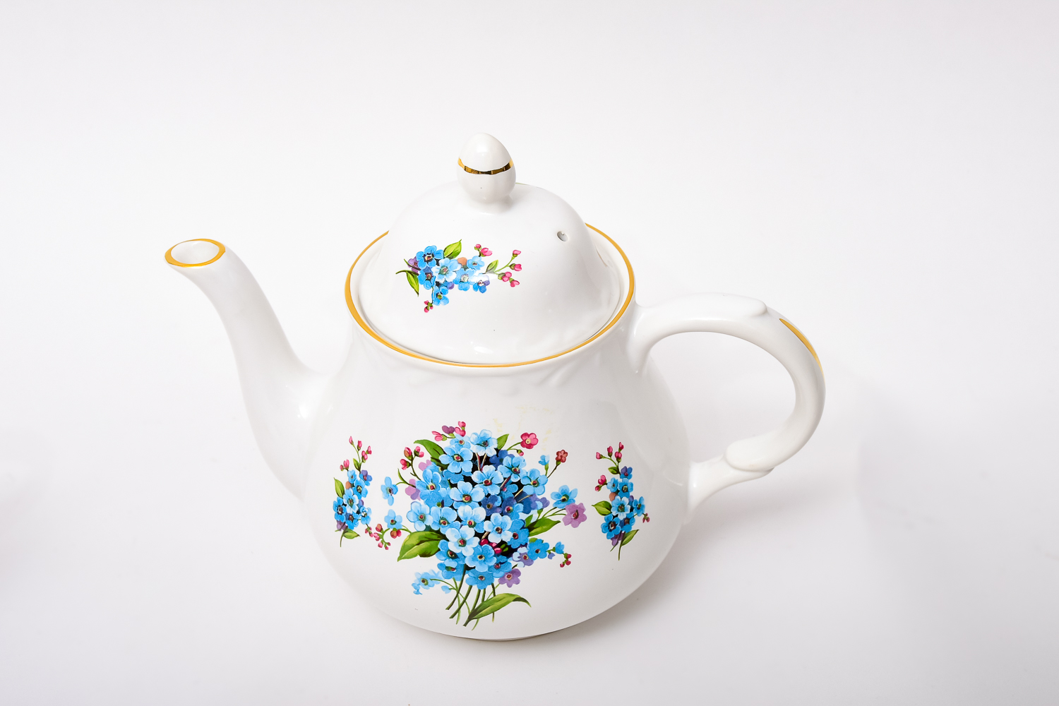 Collection of Teapots and Creamers