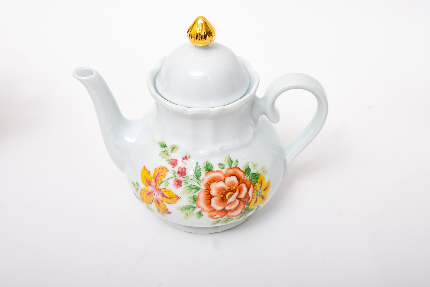 Collection of Teapots and Creamers