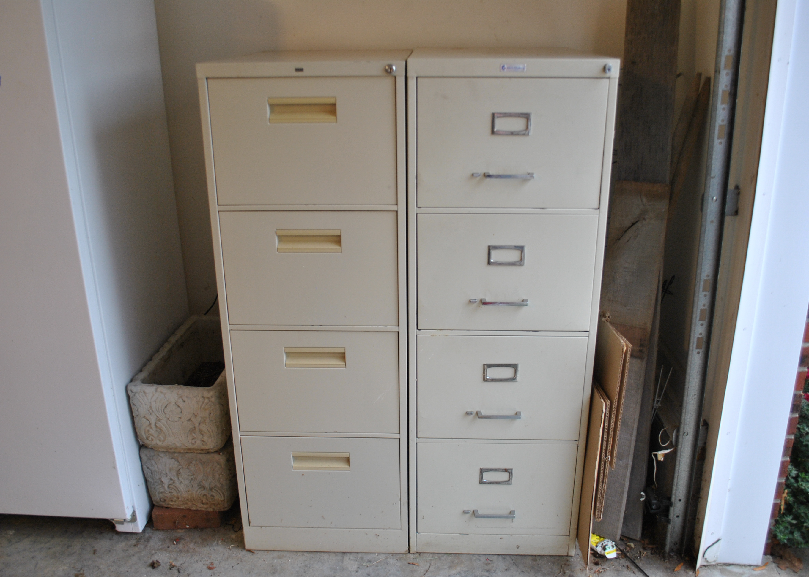 Three Metal Four Drawer Vertical Filing Cabinets