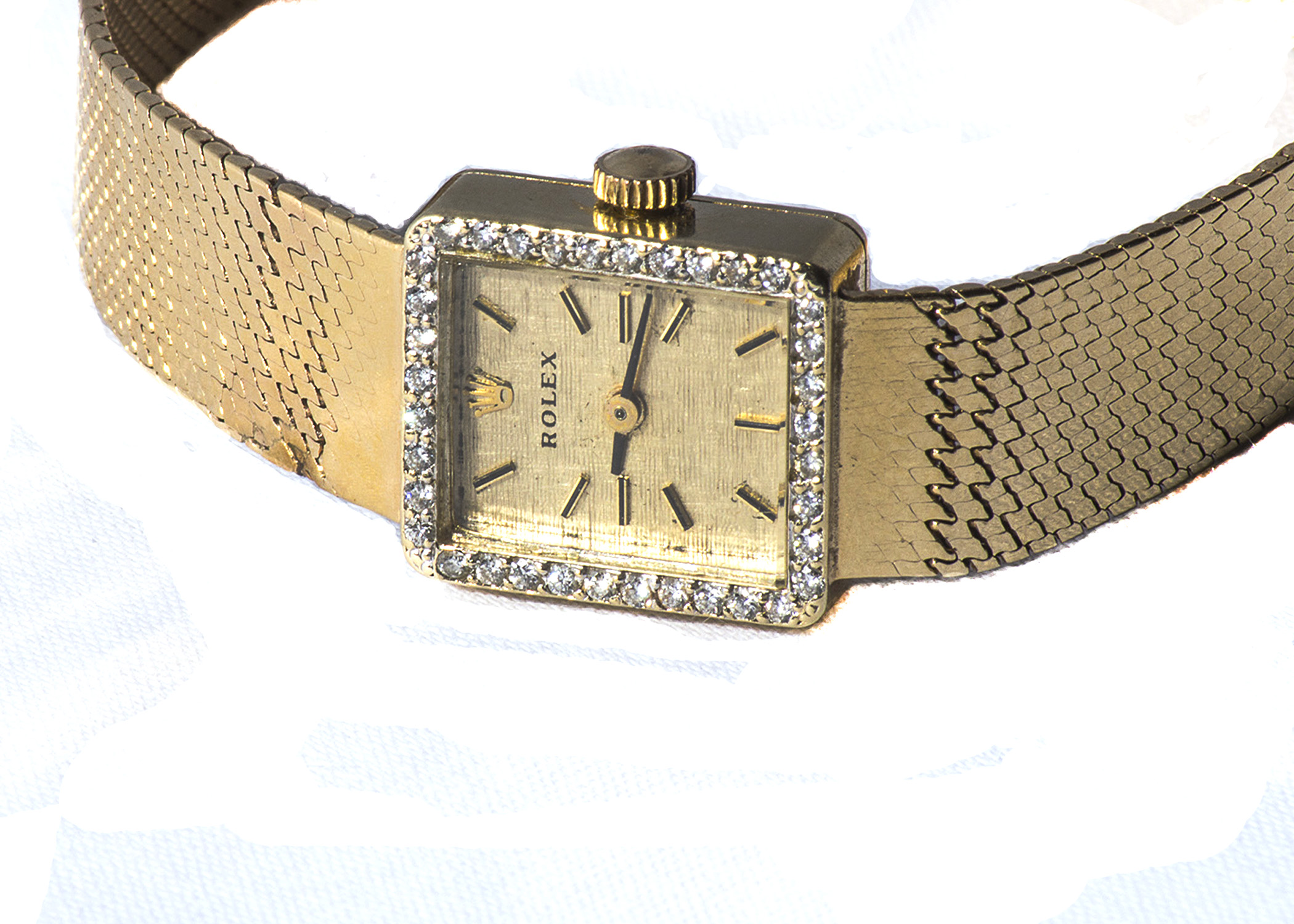 Women's 14K Gold Rolex Watch With a Diamond Bezel