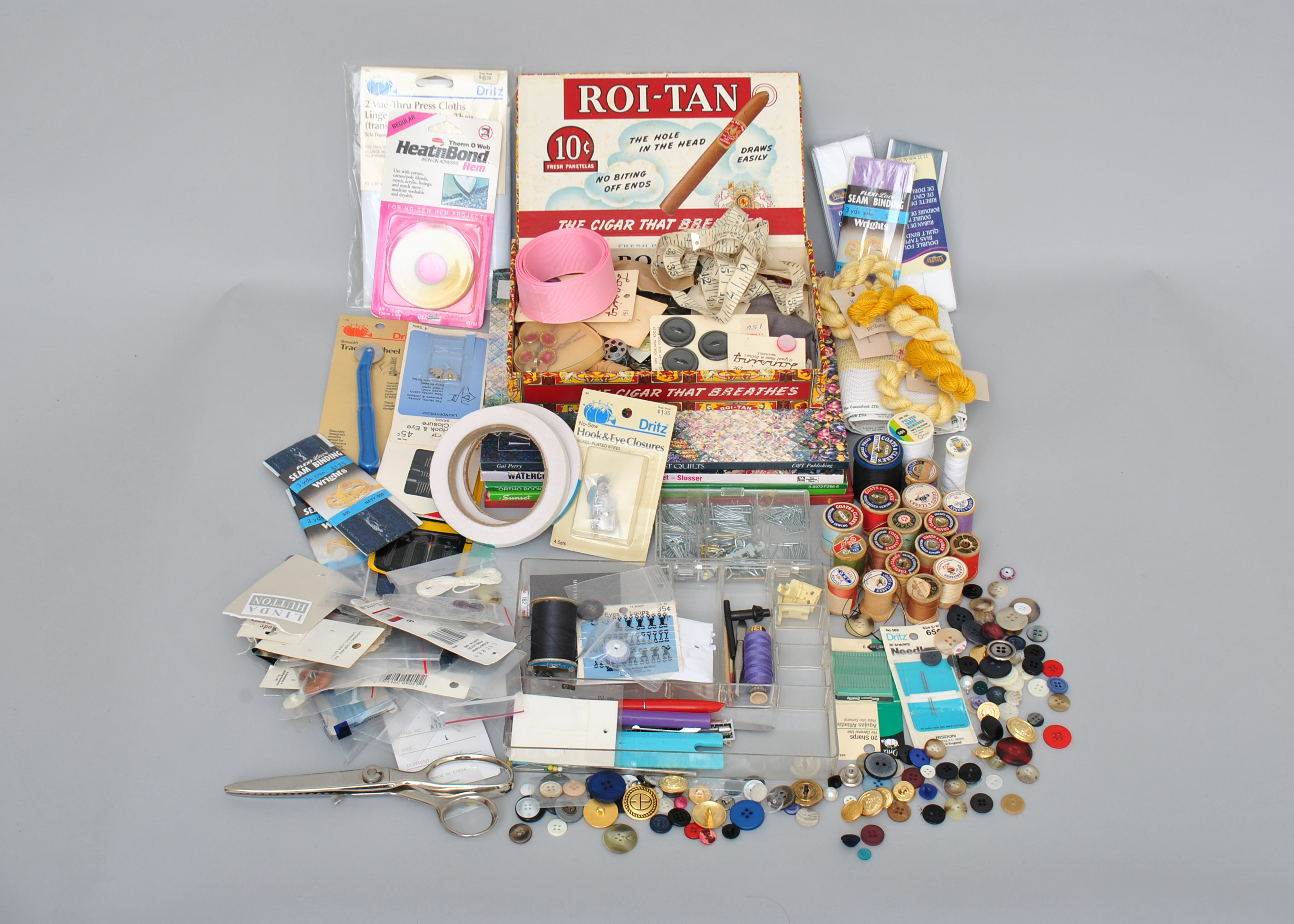 Collection of Sewing Supplies and Books