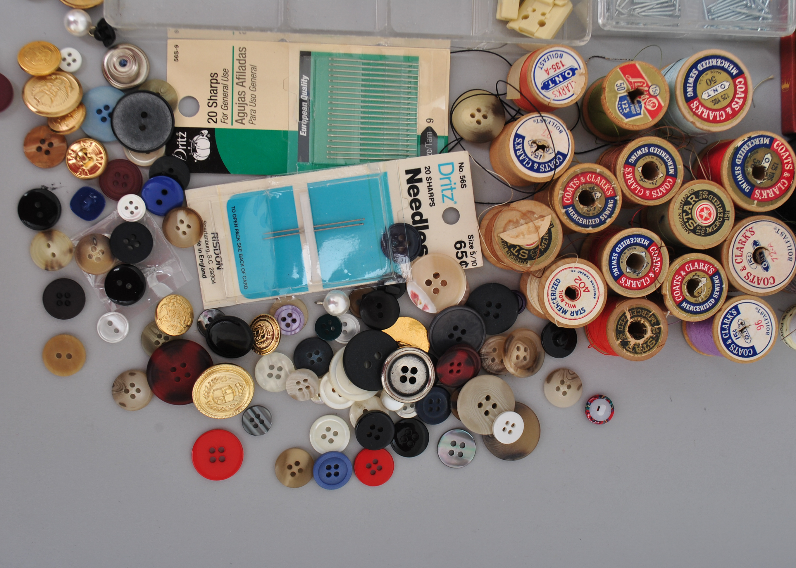 Collection of Sewing Supplies and Books