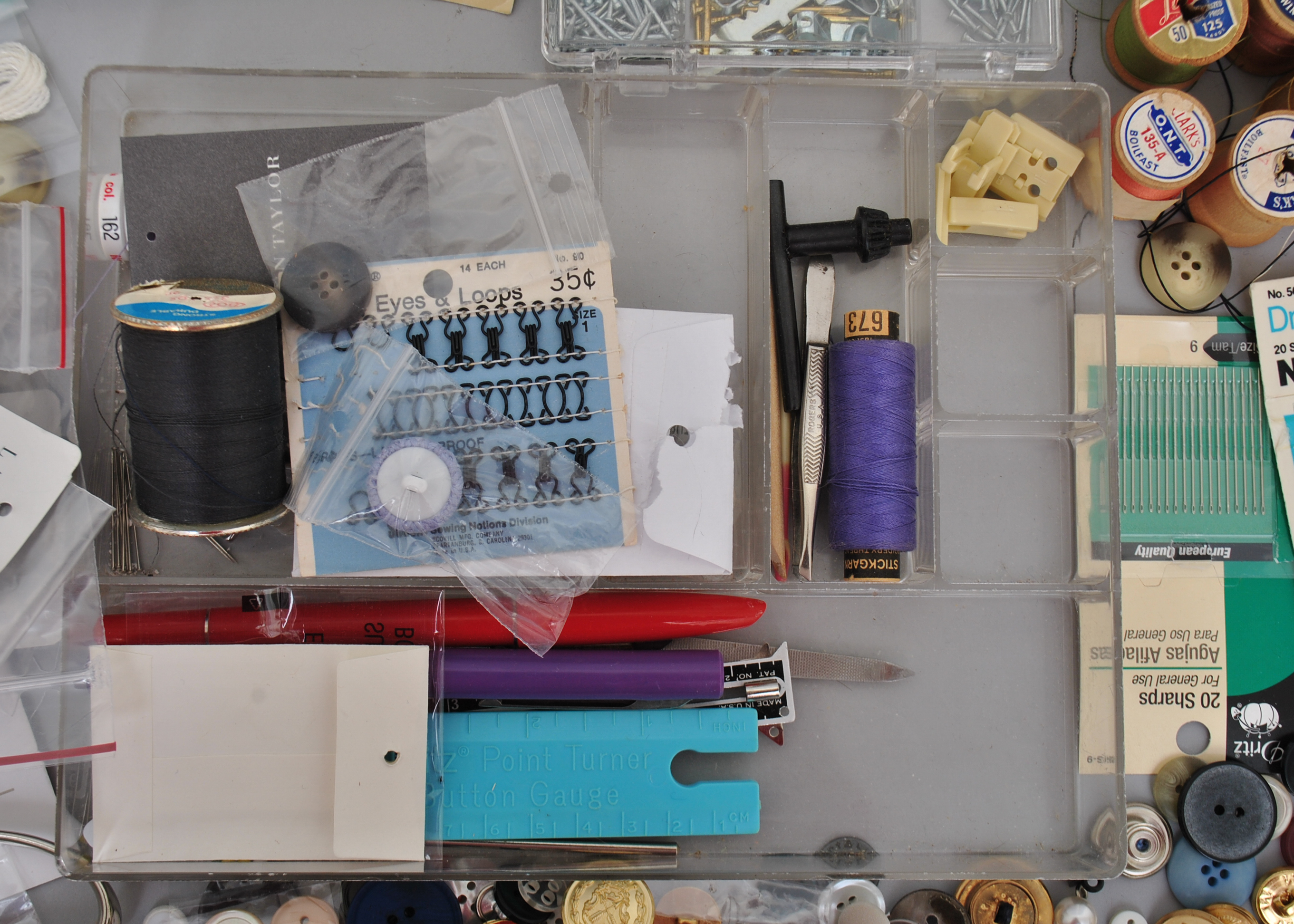 Collection of Sewing Supplies and Books