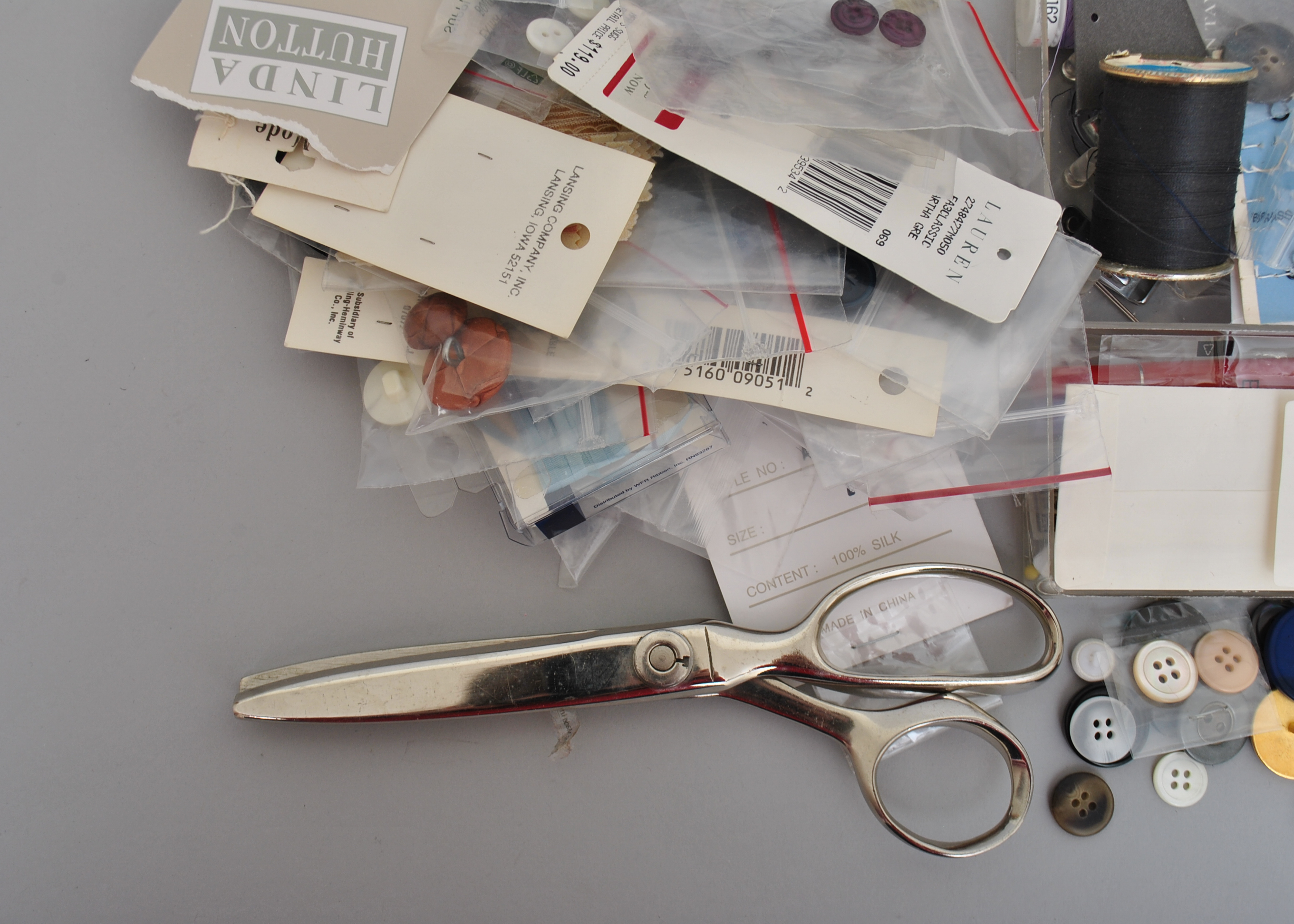 Collection of Sewing Supplies and Books