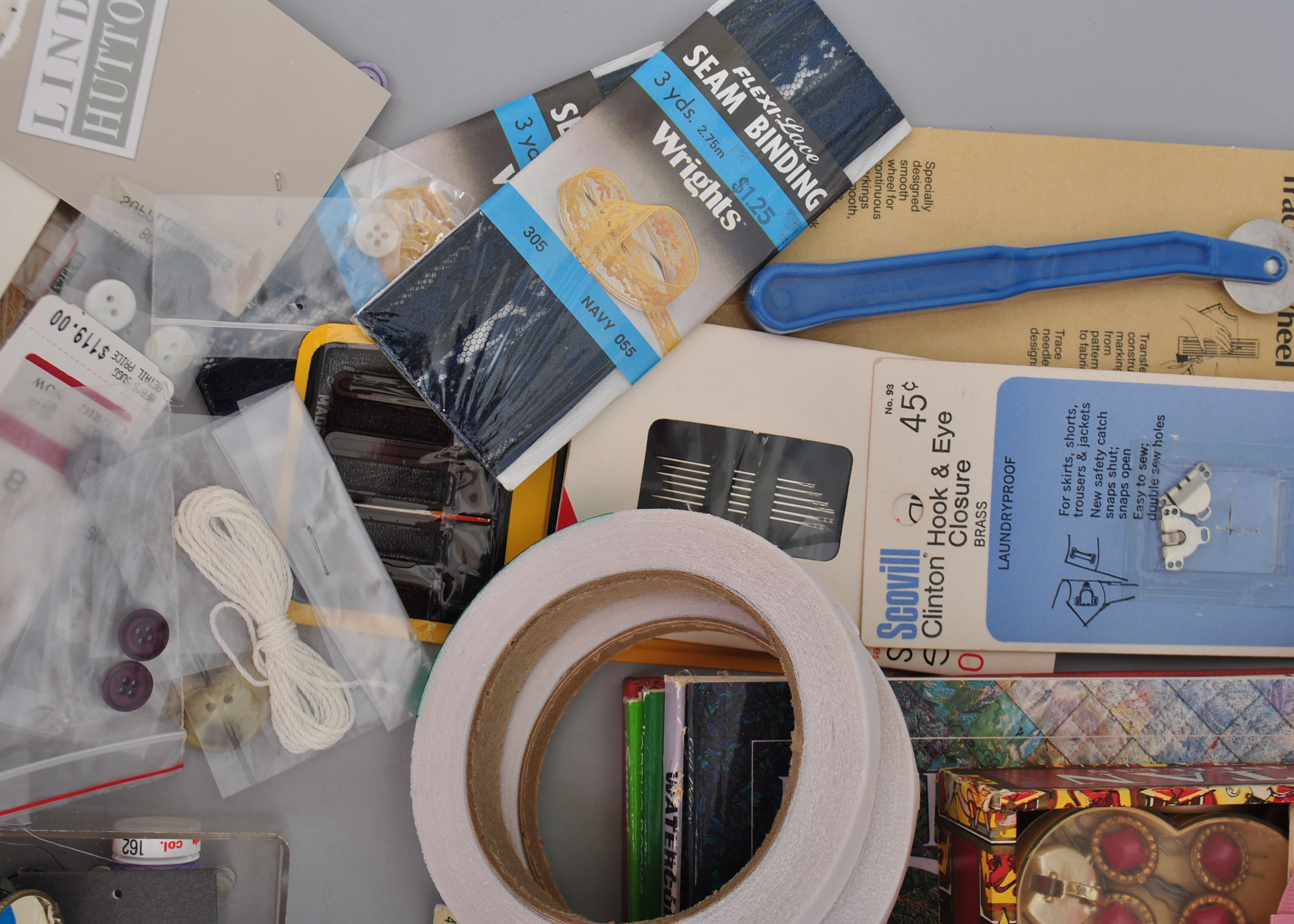 Collection of Sewing Supplies and Books