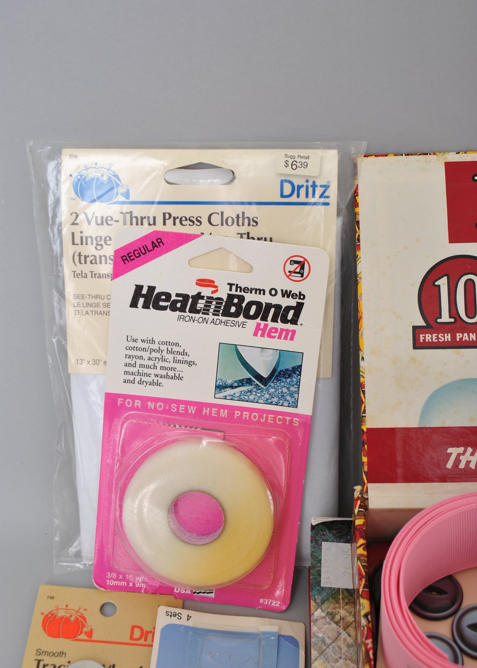 Collection of Sewing Supplies and Books