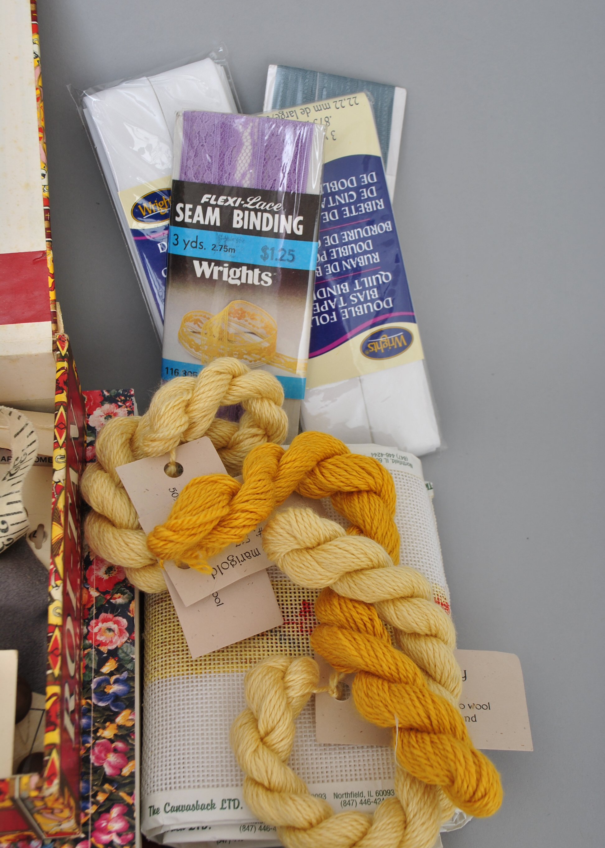 Collection of Sewing Supplies and Books