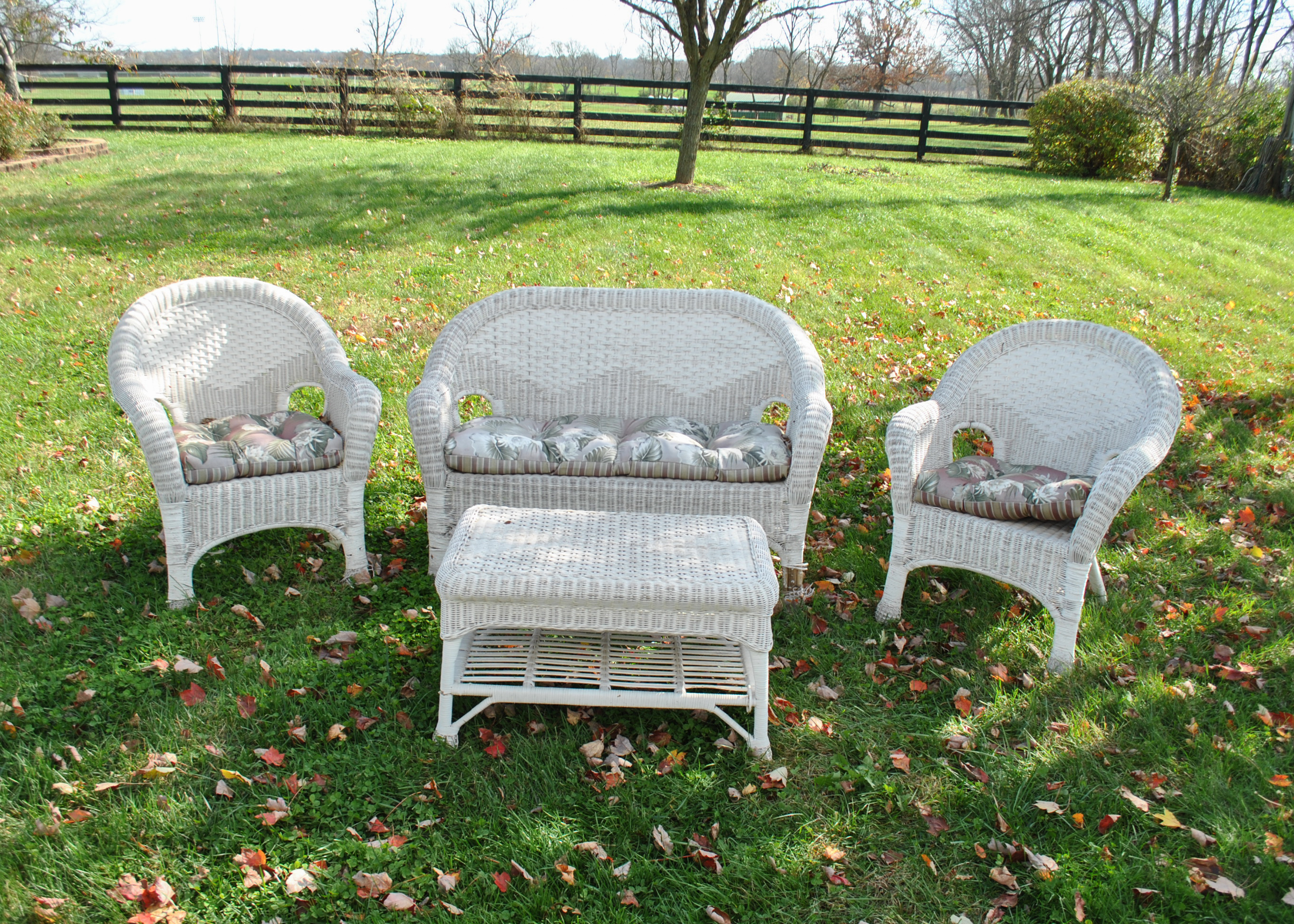 Four Piece Set of Outdoor Wicker Furniture