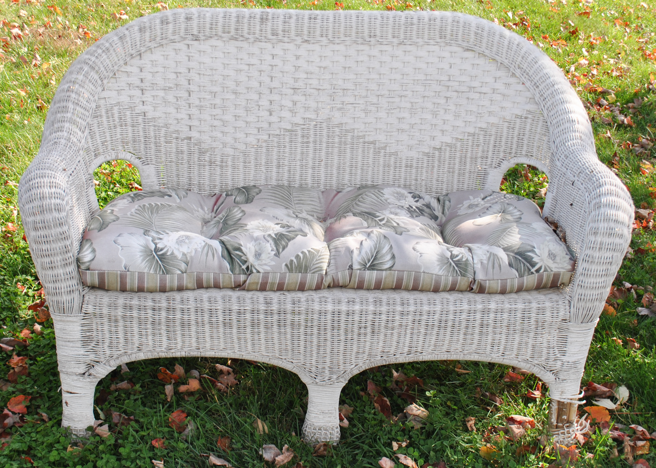Four Piece Set of Outdoor Wicker Furniture