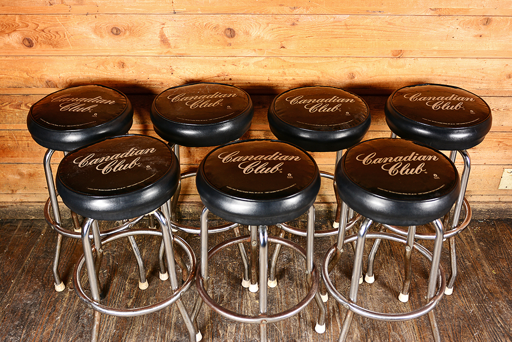 Eight Canadian Club Bar Swiveling Stools