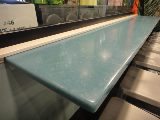 Turquoise Corian Counter with Supports