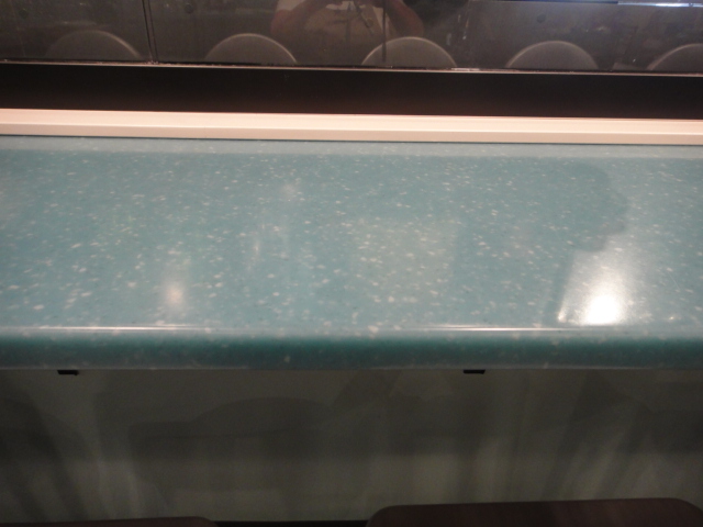 Turquoise Corian Counter with Supports