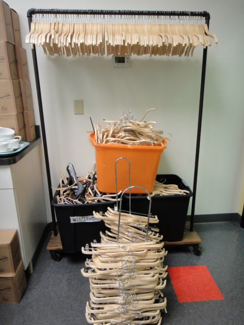 Rolling Cloths Rack Plus Wooden Hangers