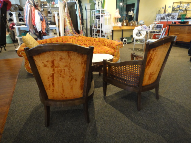 Two Orange Mid Century Arm Chairs