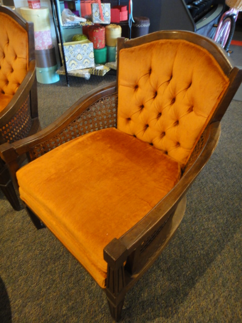 Two Orange Mid Century Arm Chairs