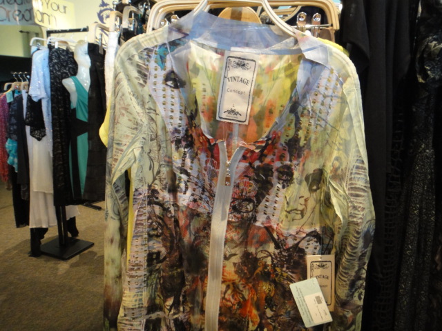 Clothing Rack Filled With New Women's Designer Clothes Size "L"