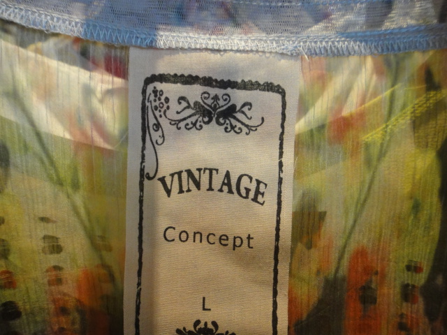 Clothing Rack Filled With New Women's Designer Clothes Size "L"