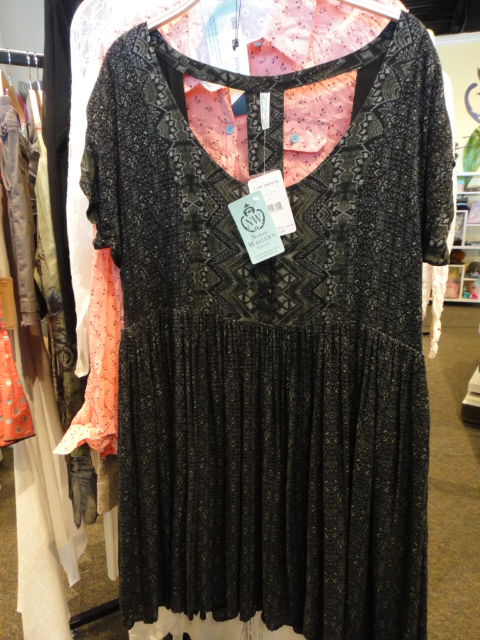 Clothing Rack Filled With New Women's Designer Clothes Size "L"