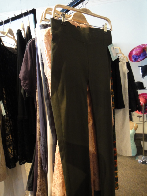 Clothing Rack Filled With New Women's Designer Clothes Size "L"