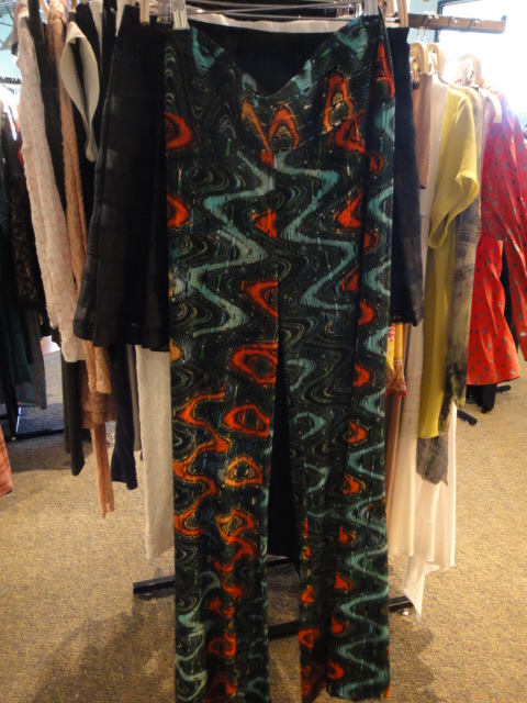 Clothing Rack Filled With New Women's Designer Clothes Size "L"