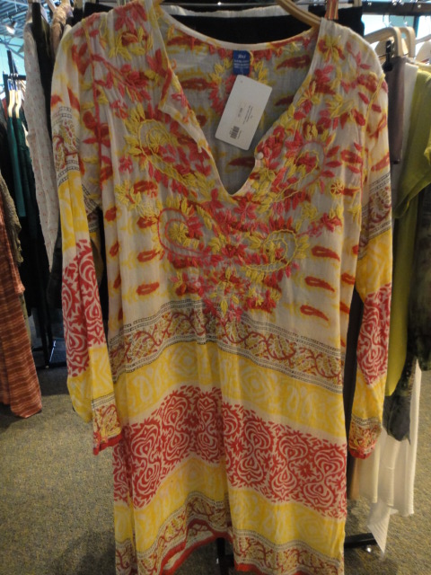 Clothing Rack Filled With New Women's Designer Clothes Size "L"