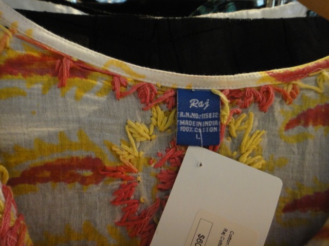 Clothing Rack Filled With New Women's Designer Clothes Size "L"