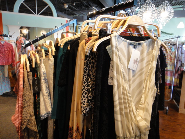 Clothing Rack Filled With New Women's Designer Clothes Size "M"