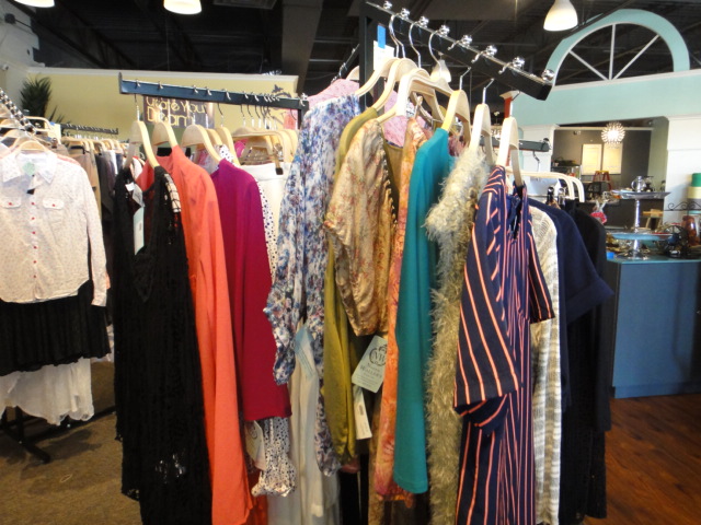 Clothing Rack Filled With New Women's Designer Cloths Size "M"