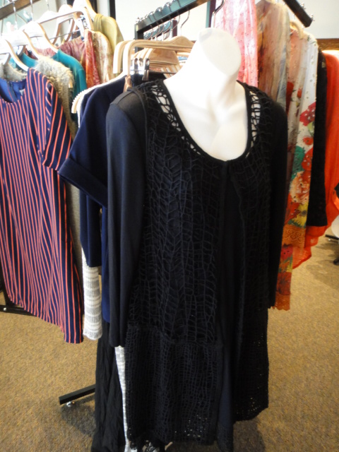 Clothing Rack Filled With New Women's Designer Cloths Size "M"