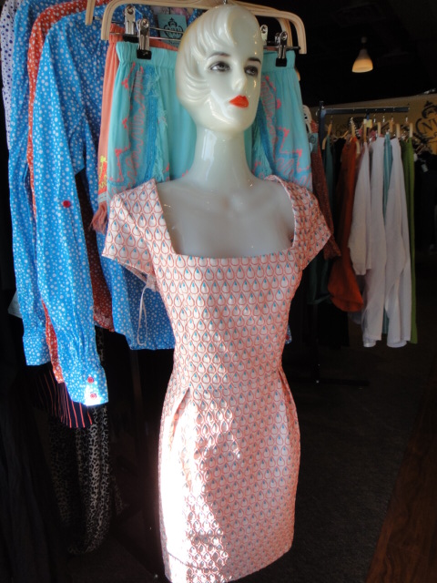 Clothing Rack Filled With New Women's Designer Cloths Size "S"