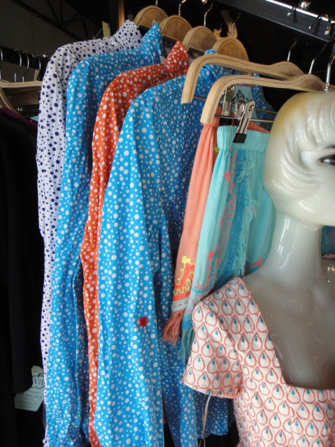 Clothing Rack Filled With New Women's Designer Cloths Size "S"