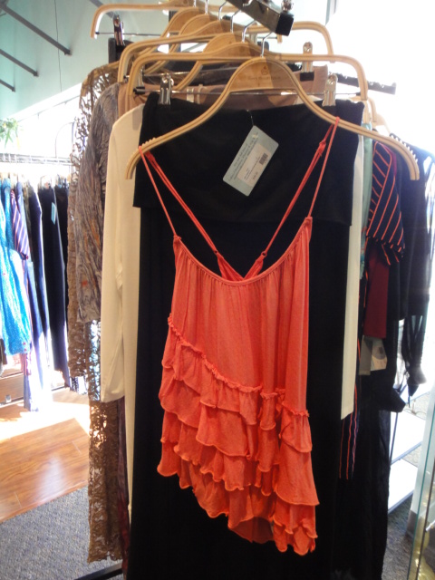 Clothing Rack Filled With New Women's Designer Cloths Size "S"