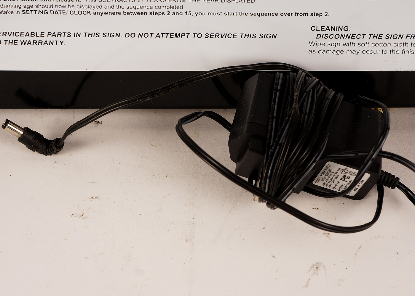 "WE I.D." Digital Readout Bar Sign