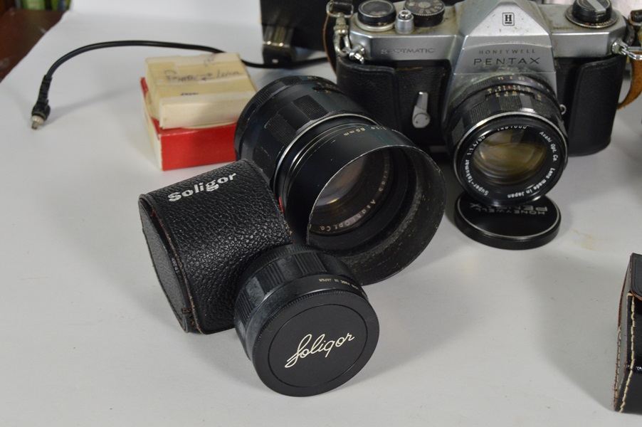 Three Pentax 35mm Cameras and Accessories