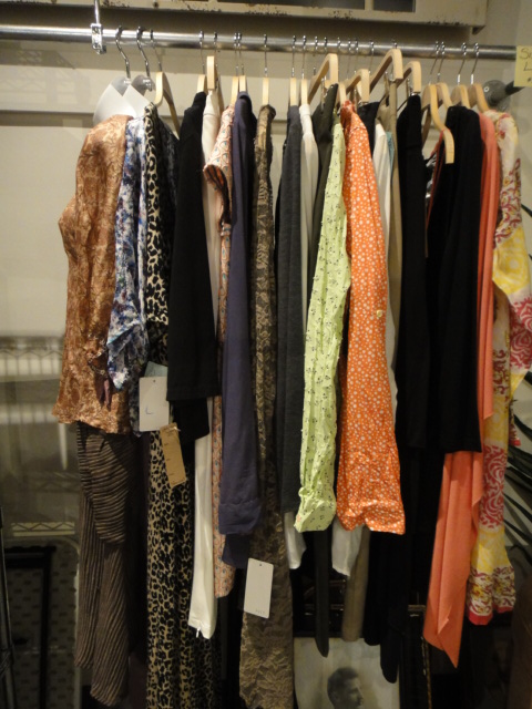 Clothing Rack Filled With New Women's Designer Clothes Size "L"