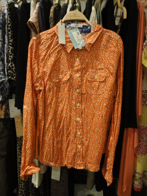 Clothing Rack Filled With New Women's Designer Clothes Size "L"