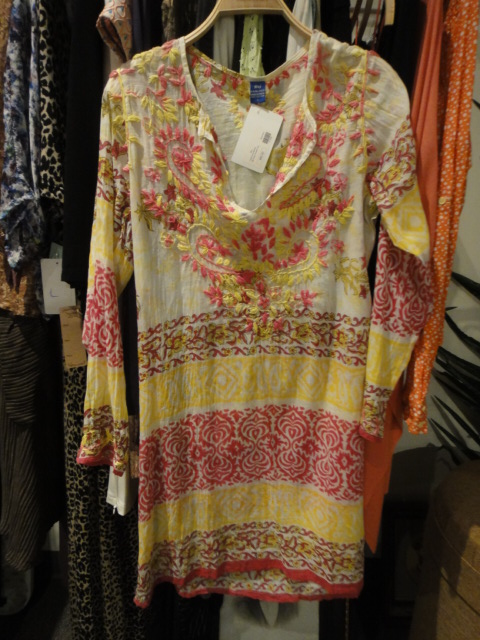 Clothing Rack Filled With New Women's Designer Clothes Size "L"