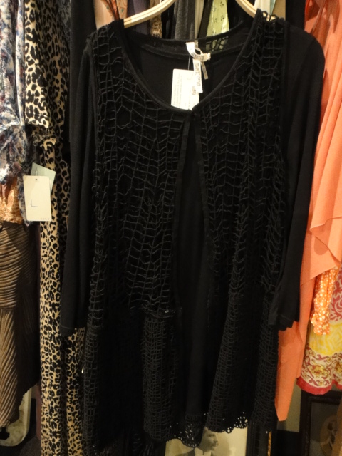 Clothing Rack Filled With New Women's Designer Clothes Size "L"