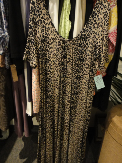 Clothing Rack Filled With New Women's Designer Clothes Size "L"