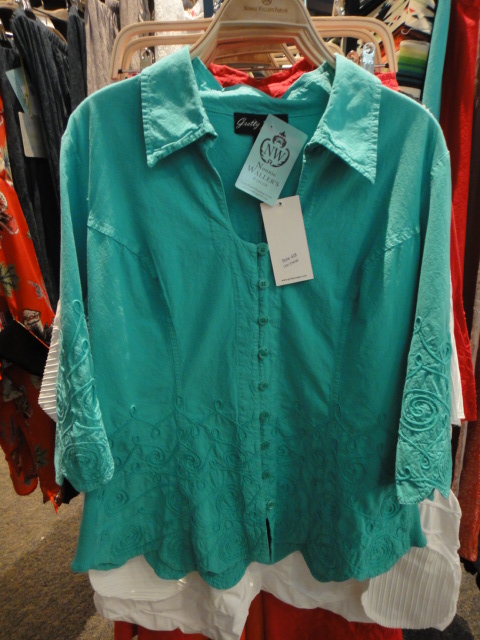 Clothing Rack Filled With New Women's Designer Cloths Plus