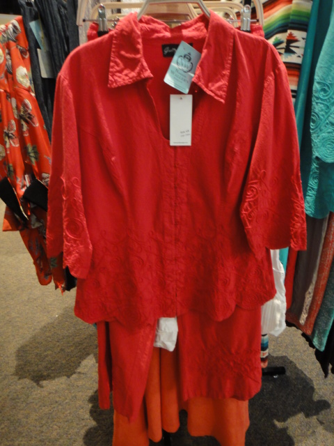 Clothing Rack Filled With New Women's Designer Cloths Plus