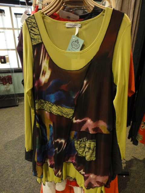 Clothing Rack Filled With New Women's Designer Cloths Plus