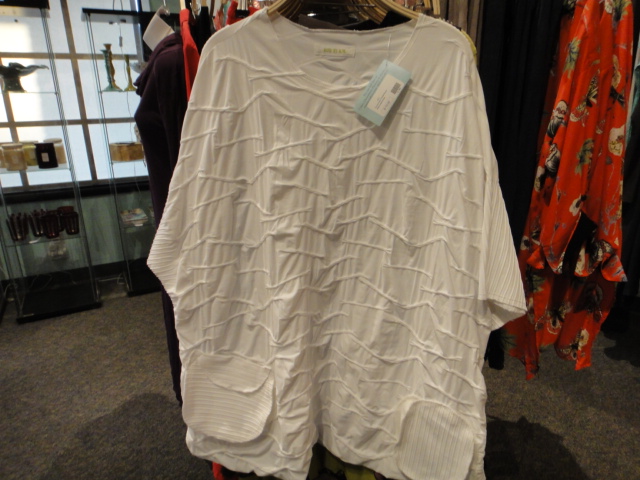 Clothing Rack Filled With New Women's Designer Cloths Plus