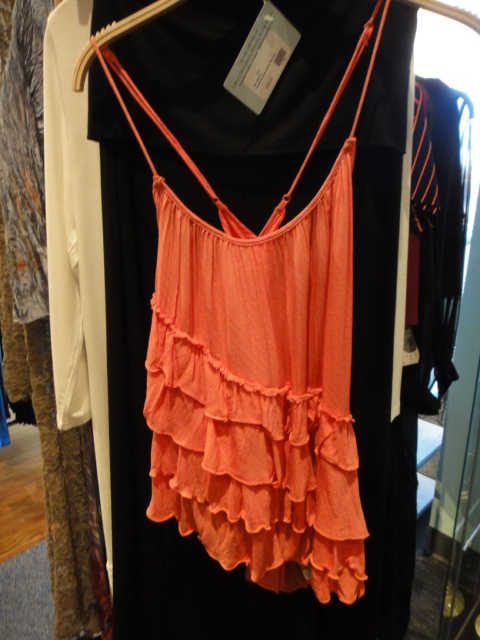 Clothing Rack Filled With New Women's Designer Cloths Size "S"