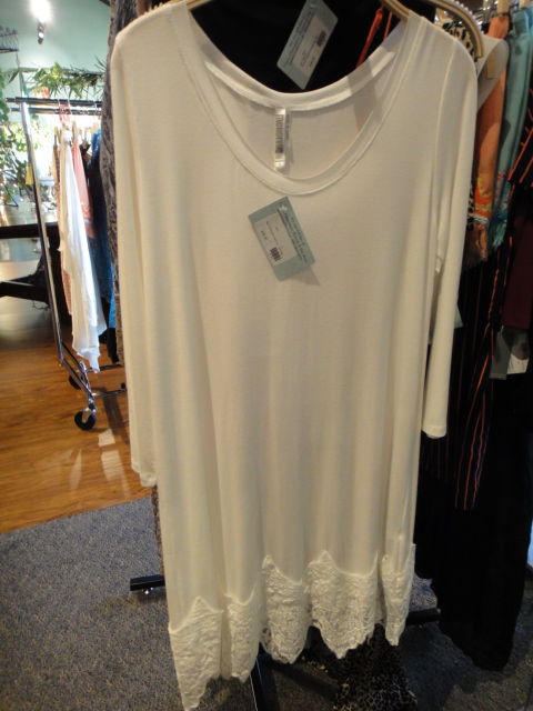 Clothing Rack Filled With New Women's Designer Cloths Size "S"