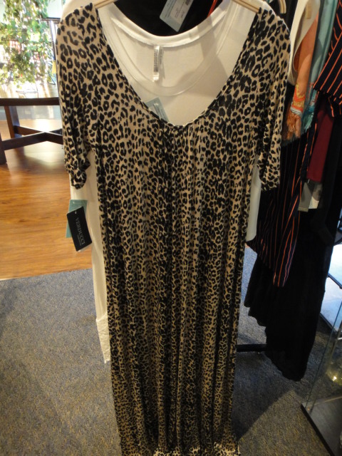 Clothing Rack Filled With New Women's Designer Cloths Size "S"