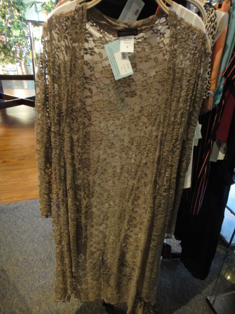 Clothing Rack Filled With New Women's Designer Cloths Size "S"