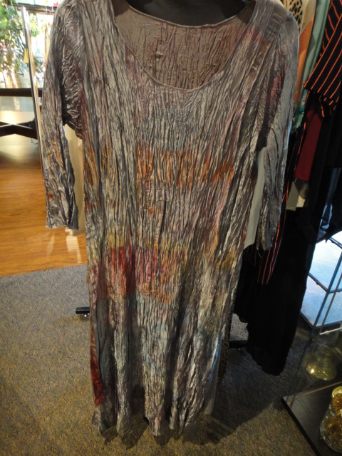 Clothing Rack Filled With New Women's Designer Cloths Size "S"