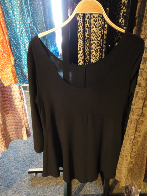 Clothing Rack Filled With New Women's Designer Cloths Size "S"